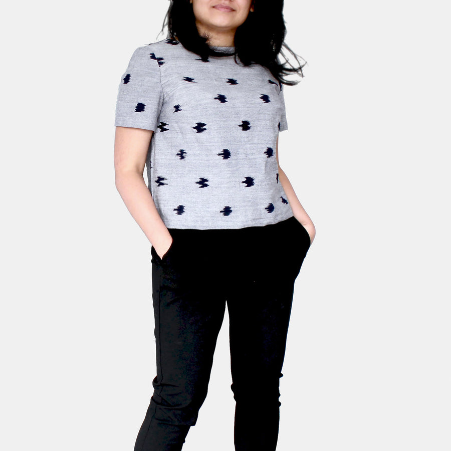Front view of female model wearing Eden Crop Top in Ikat Cotton - Indigo Speckle