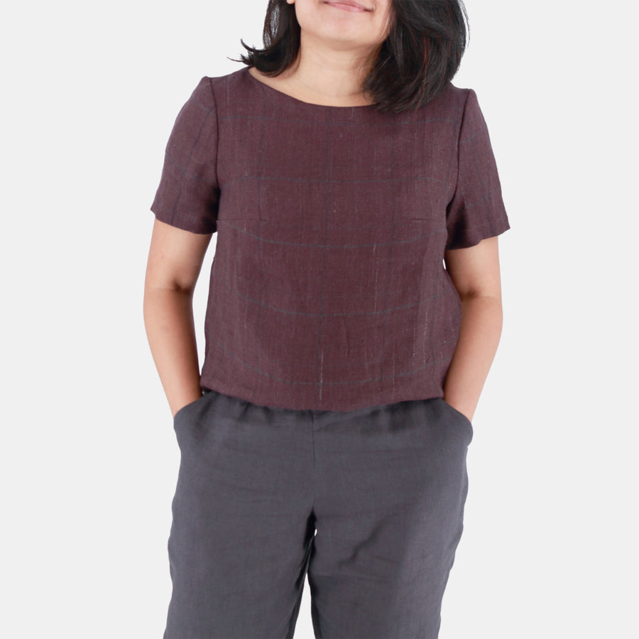 Front View of Womens Top in Midweight Linen. Color of the top is muted plum or brownish purple.