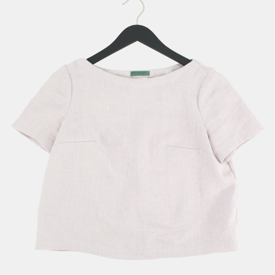 On a hanger, front view of womens crop top in Midweight Linen. Color of the top is snow grey.